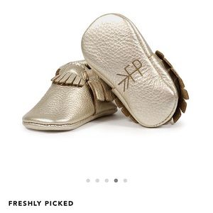 Freshly Picked platinum baby moccasins in size 3. Brand new never worn